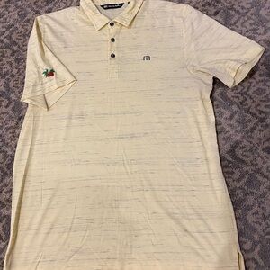 Travis Mathew Men’s Pale Yellow Heather Polo with Subtle Heathering